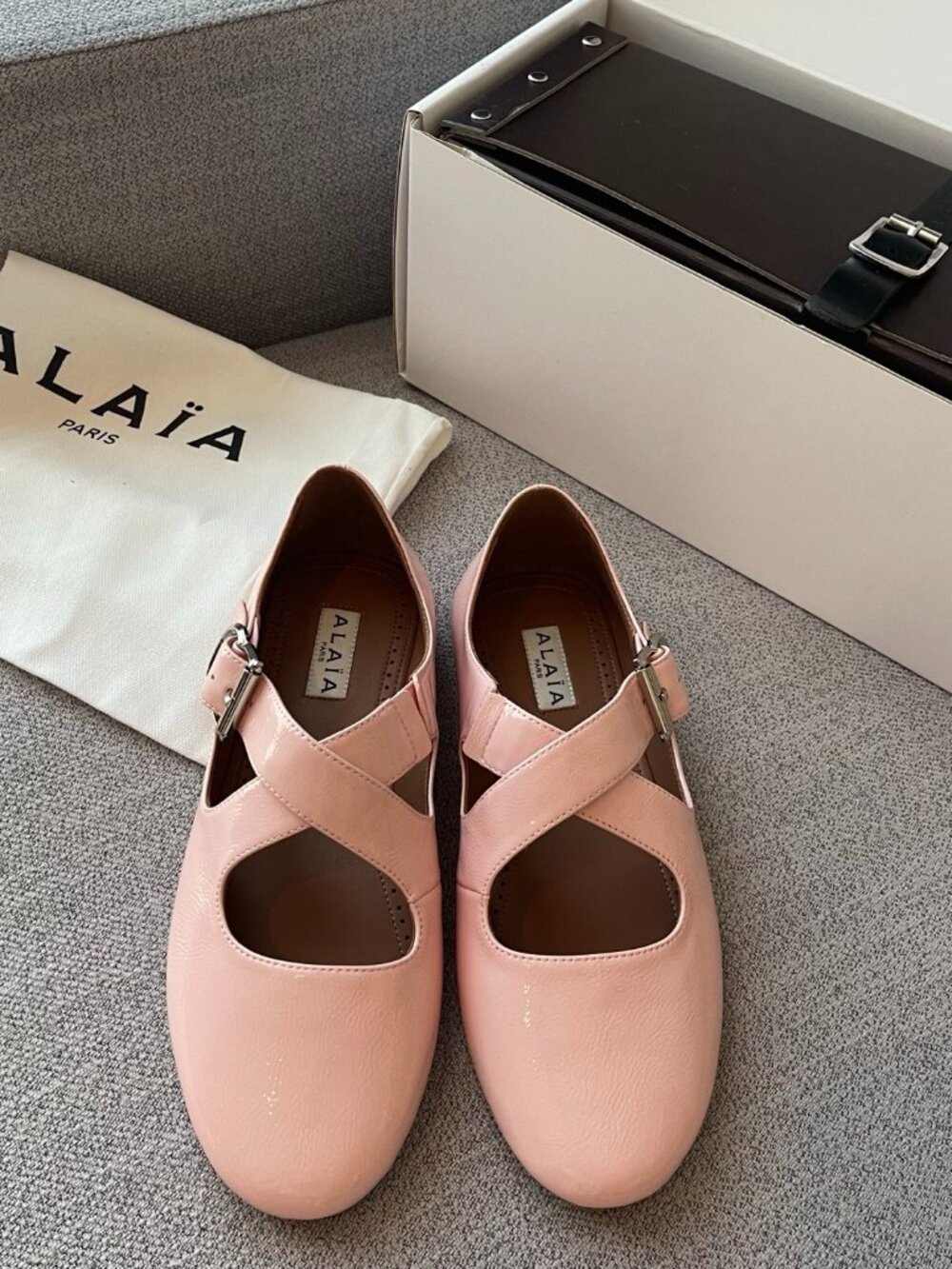Alaïa Light Pink Patent Leather Crisscross-Strap Mary Jane Flats